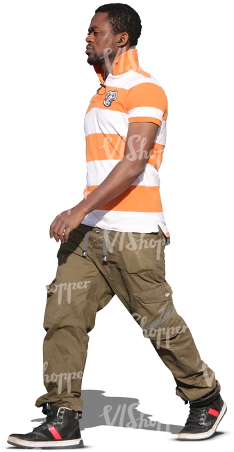 black man walking in summertime