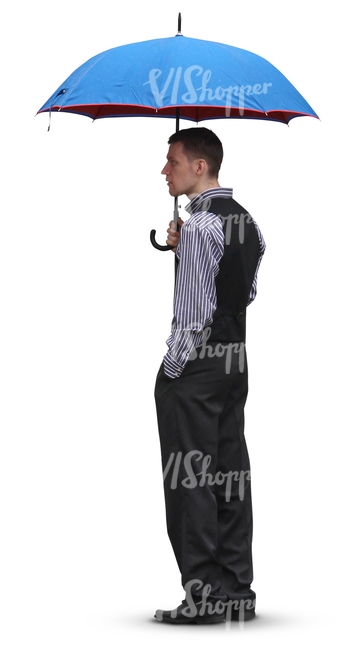 man in a suit standing uder an umbrella