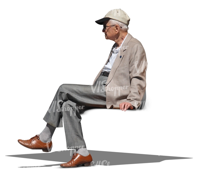 elderly man in a grey jacket sitting
