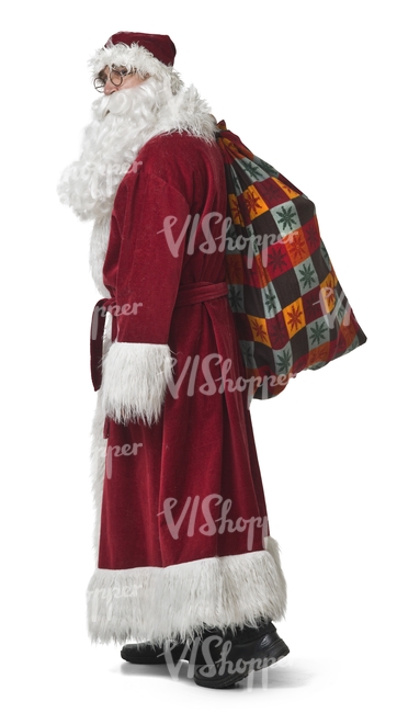 Santa Claus standing with a bag during Christmas