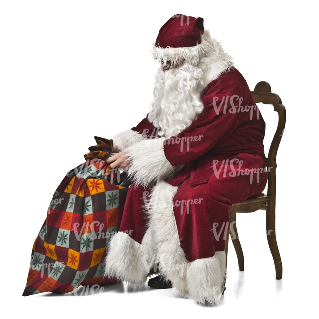 Santa Claus with a bag of gifts sitting on a chair