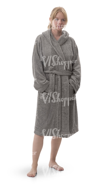 woman in a gray bathrobe standing 