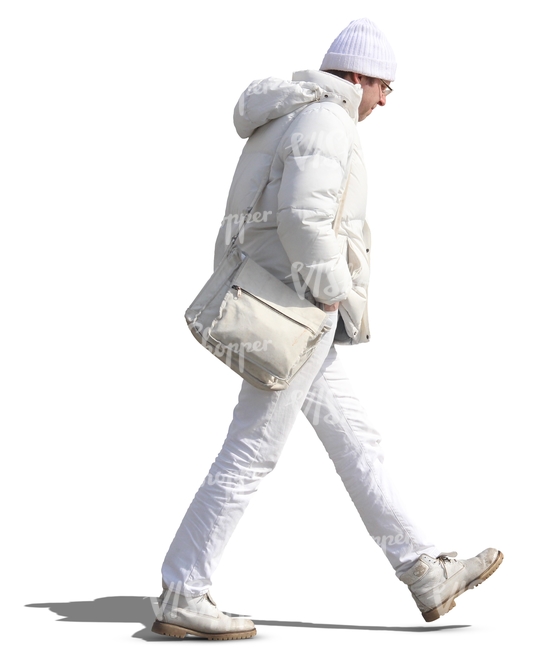 man in white winter clothes walking