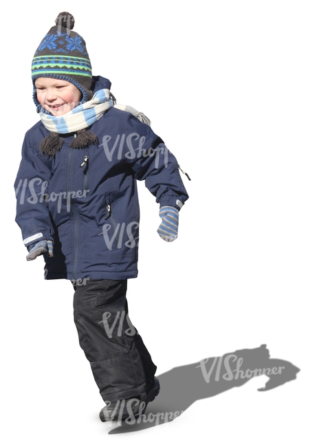 smiling boy running in winter clothes