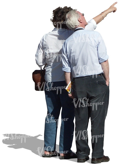older couple standing and pointing