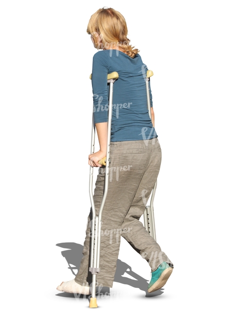 woman walking with crutches