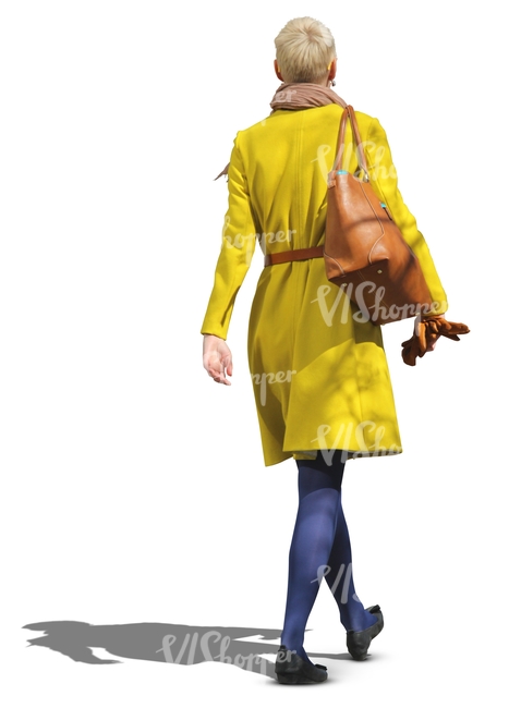 woman in a yellow coat walking
