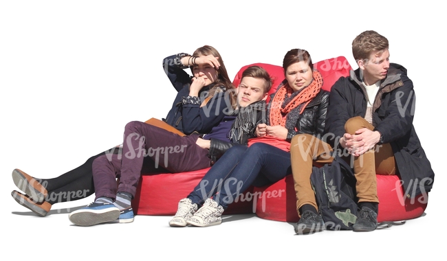 group of youngsters sitting on cushions