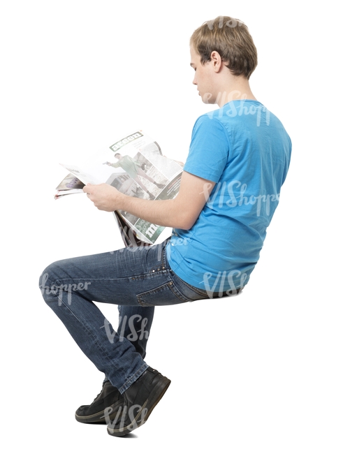 young man sitting and reading a newspaper