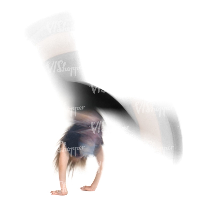 motion blur image of a child doing a cartwheel