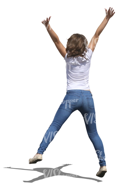 young girl jumping up in the air