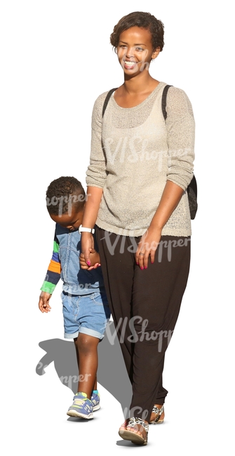 black woman with a child walking and smiling