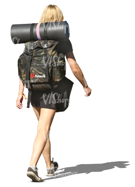 woman walking with a backpack