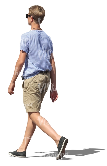 young man walking on the street