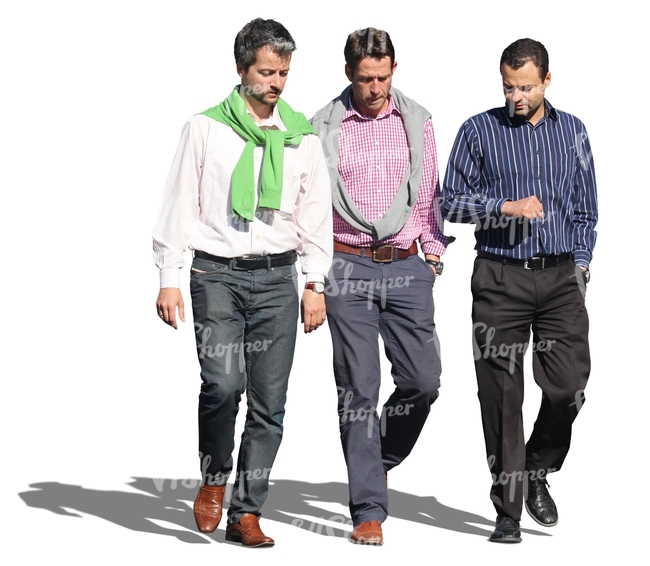group of three men walking and talking