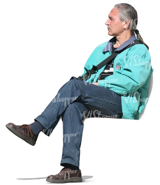 A man with grey long hair sitting
