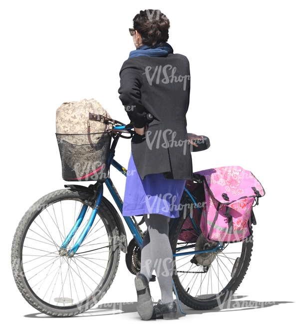 woman standing next to her bicycle