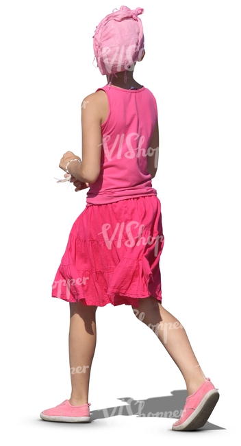 girl in a pink shirt and skirt walking