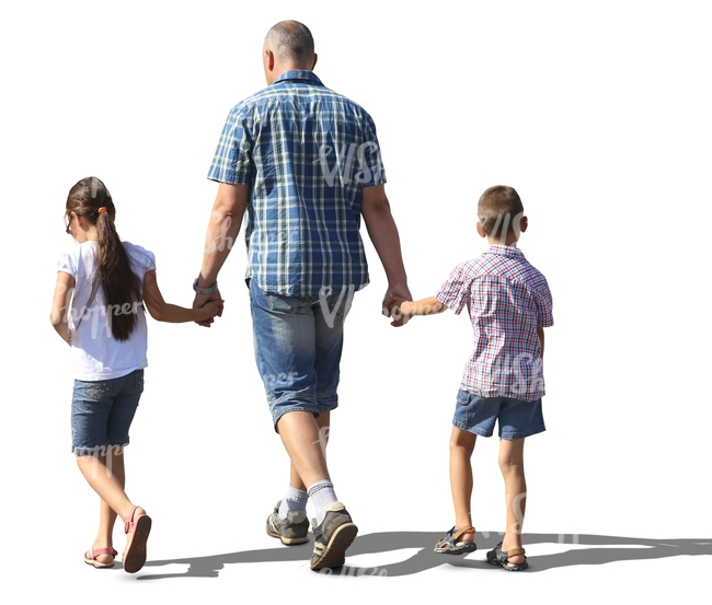 man walking with his two children hand in hand