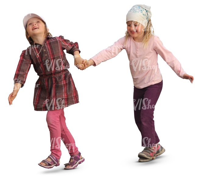 two smiling girls walking hand in hand