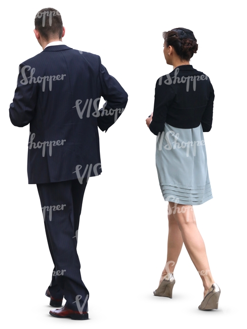 man and woman in formal clothes walking