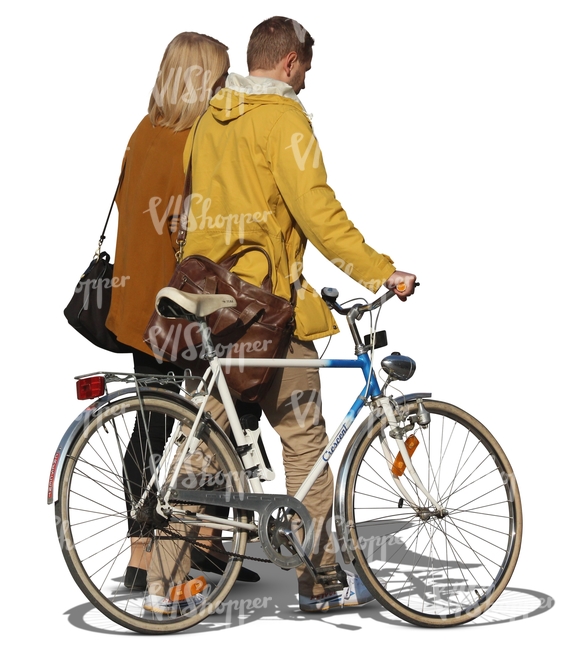 man and woman walking next to a bicycle