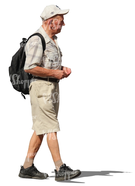 elderly man with a backpack walking