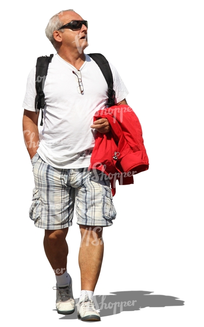 elderly man walking and looking up