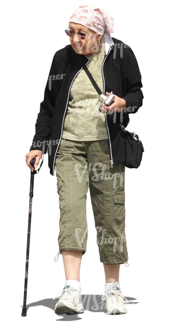 elderly woman with a camera walking with a stick