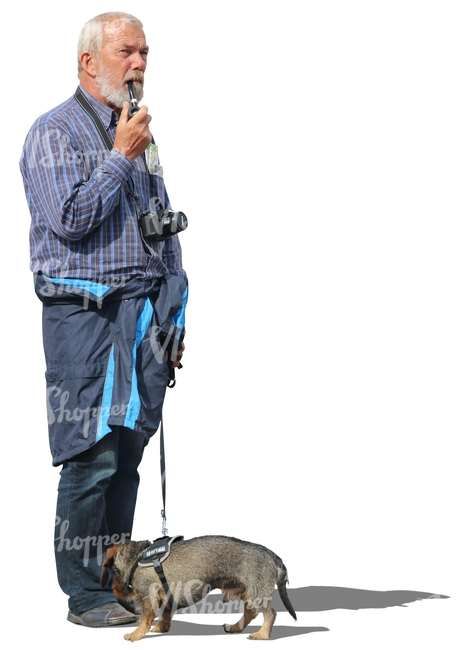 elderly man with a dog standing and smoking