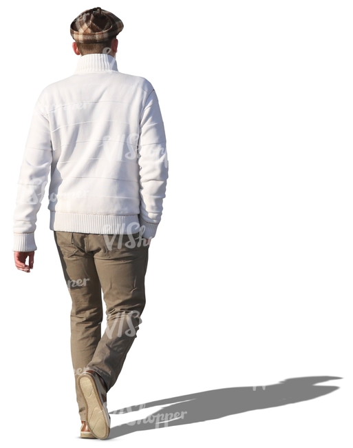 man in a white sweater walking