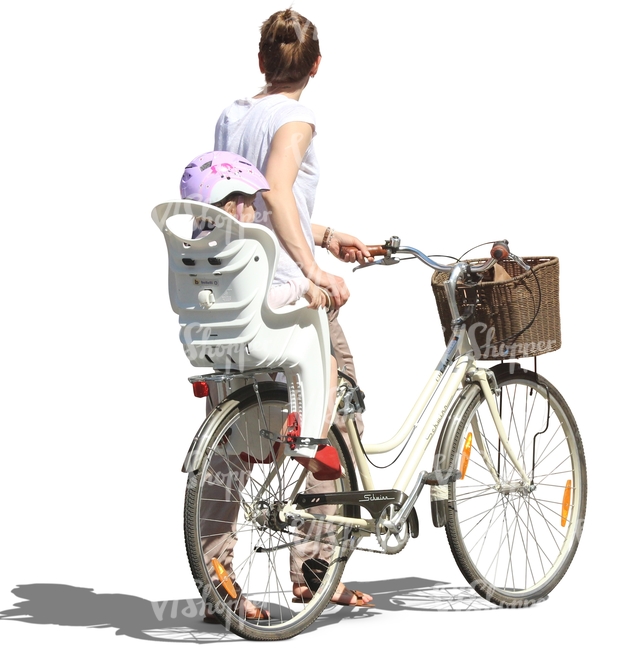 woman pushing a bicycle with a child on it