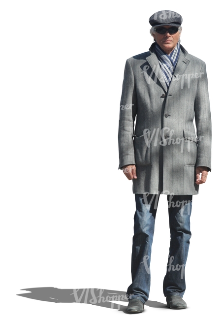 elderly man on a grey coat standing