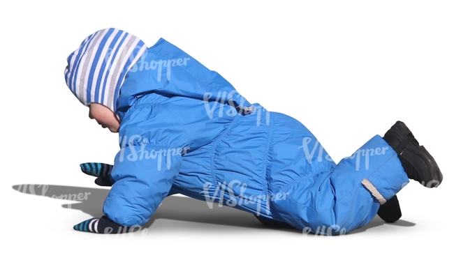 toddler in a blue bunting playing on the ground