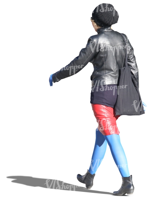 woman in a colorful outfit walking