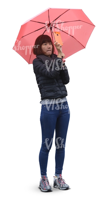 asian woman with an umbrella taking a picture with a phone