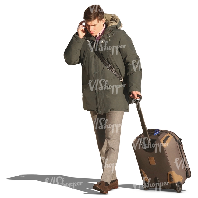 man with a suitcase talking on the phone