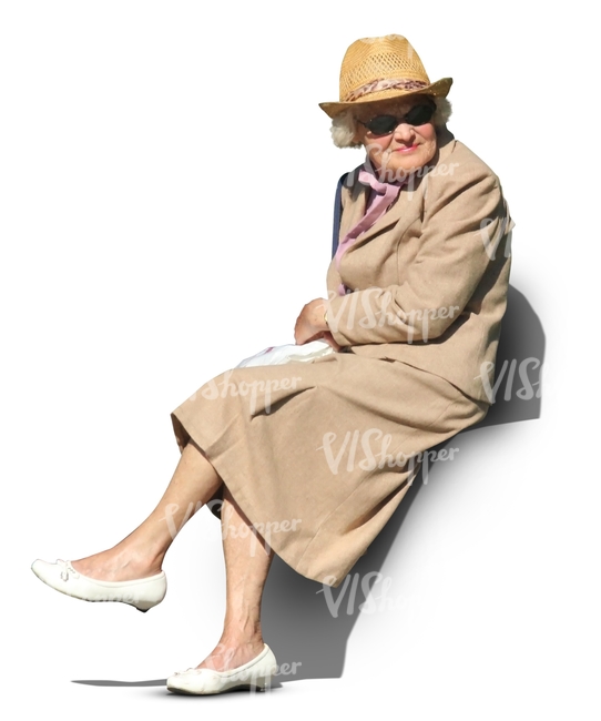 elderly woman in a beige spring coat sitting in the sun