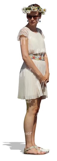 woman in a white dress standing