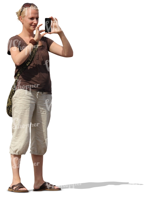 cut out blond woman taking a picture