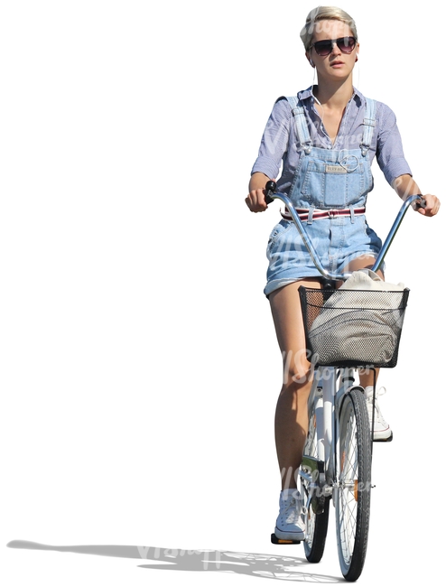 woman in denim shorts riding a bike