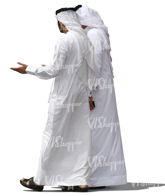two arab men wearing dishdashas walking
