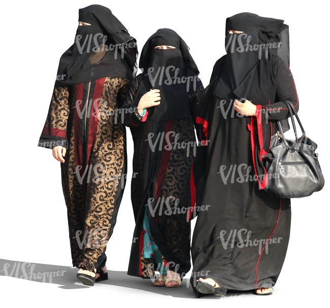 three arab women in abayas walking
