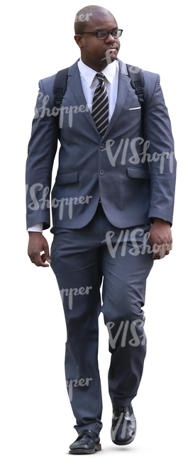 black man in a grey suit walking