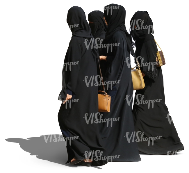four arab women in abayas walking