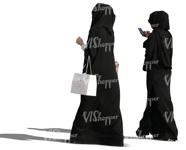 two muslim women with shopping bags