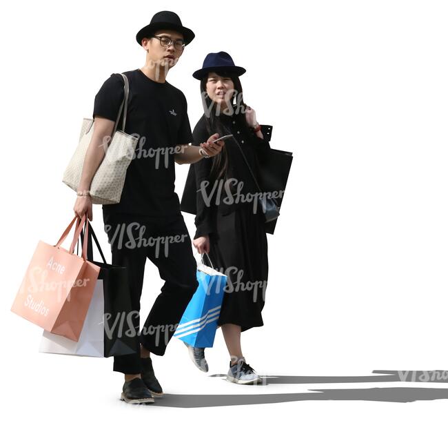 asian couple with shopping bags walking.