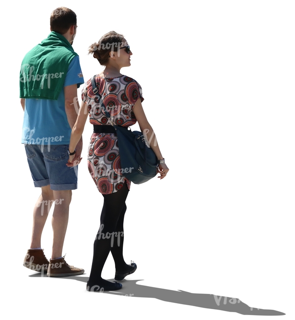 cut out backlit couple walking hand in hand