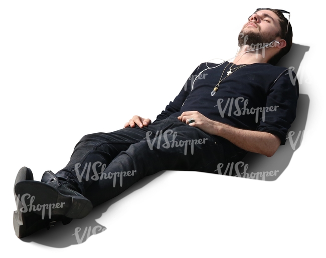 cut out man lying and listening to music
