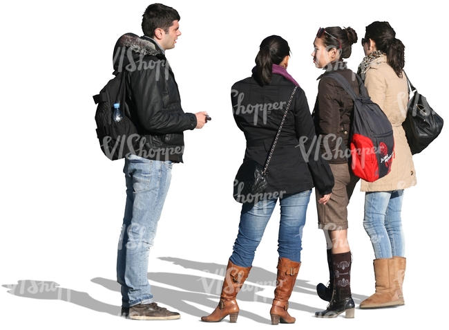 group of people in winter jackets standing together